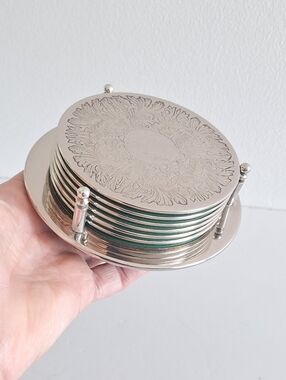 Set of six silver-plated coasters
